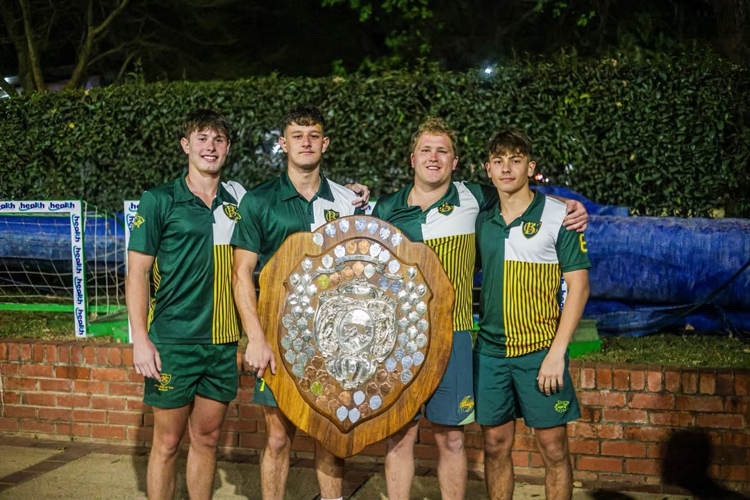 CBC players celebrating with the trophy
